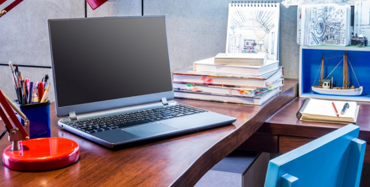 Designer modern home office desk with laptop