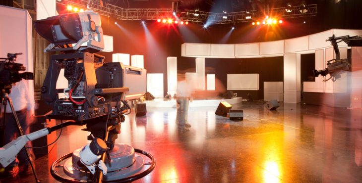 Empty television studio with camera
